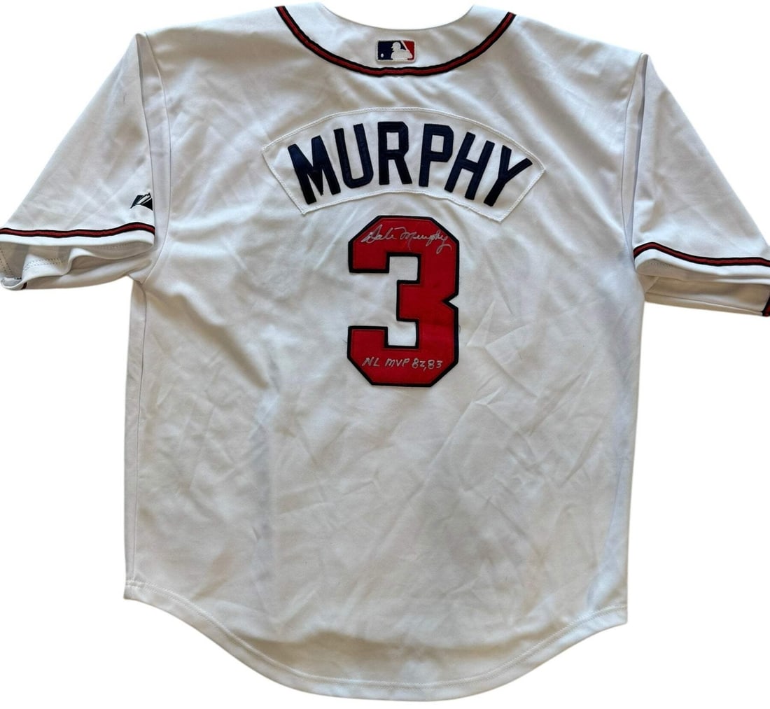 Murphy Dale Autographed Braves Authentic Majestic Jersey: Murphy Dale Autographed Braves Authentic Majestic Jersey Signed by Dale Murphy across the jersey number with inscription "NL MVP 82, 83" in silver sharpie on an authentic Braves Majestic jersey. This 