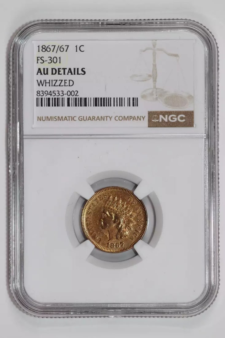 1867/ 67 INDIAN HEAD CENT AU DETAILS - LOOKS UNC VERY RARE: 1867/ 67 INDIAN HEAD CENT AU DETAILS - LOOKS UNC VERY RARE Copper Cent from 1867/67, graded AU by NGC. This coin features Indian Head design and bears details consistent with its circulated status. Th