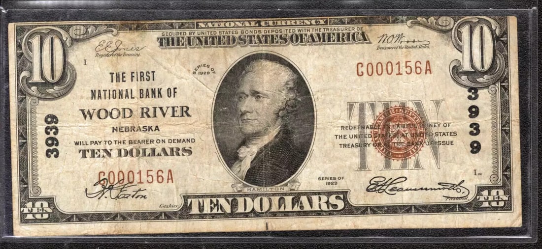 $10 Banknote Currency Nebraska Wood River National First: $10 Banknote Currency Nebraska Wood River National First Circulated $10 Banknote Currency from 1929, bearing the signature of an artist. This note features a unique serial number and is part of the Ne