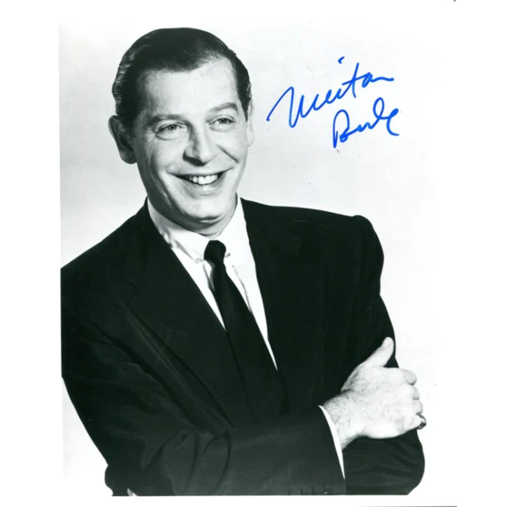 Milton Bertle Autographed 8x10 Photo: Milton Bertle Autographed 8x10 Photo Item Specifics: Signed in blue sharpie across the photo.Mitlon is posing in his suit in this black and white photo Item is authenticated by . Product Disclaimer: N