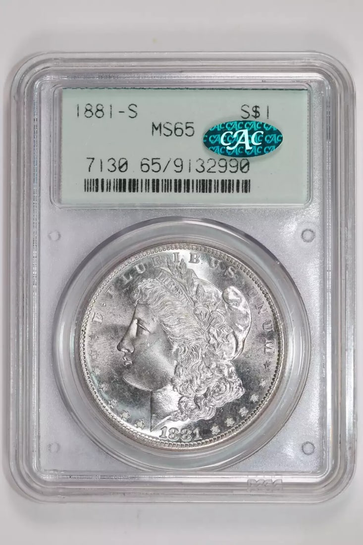1881-S MORGAN DOLLAR PCGS MS65 CAC OGH - VERY PQ LOOKS NICER: 1881-S MORGAN DOLLAR PCGS MS65 CAC OGH - VERY PQ LOOKS NICER The 1881-S Morgan Dollar graded MS65 by PCGS and CAC boasts exceptional condition, with its silver surface gleaming in the light. This unci