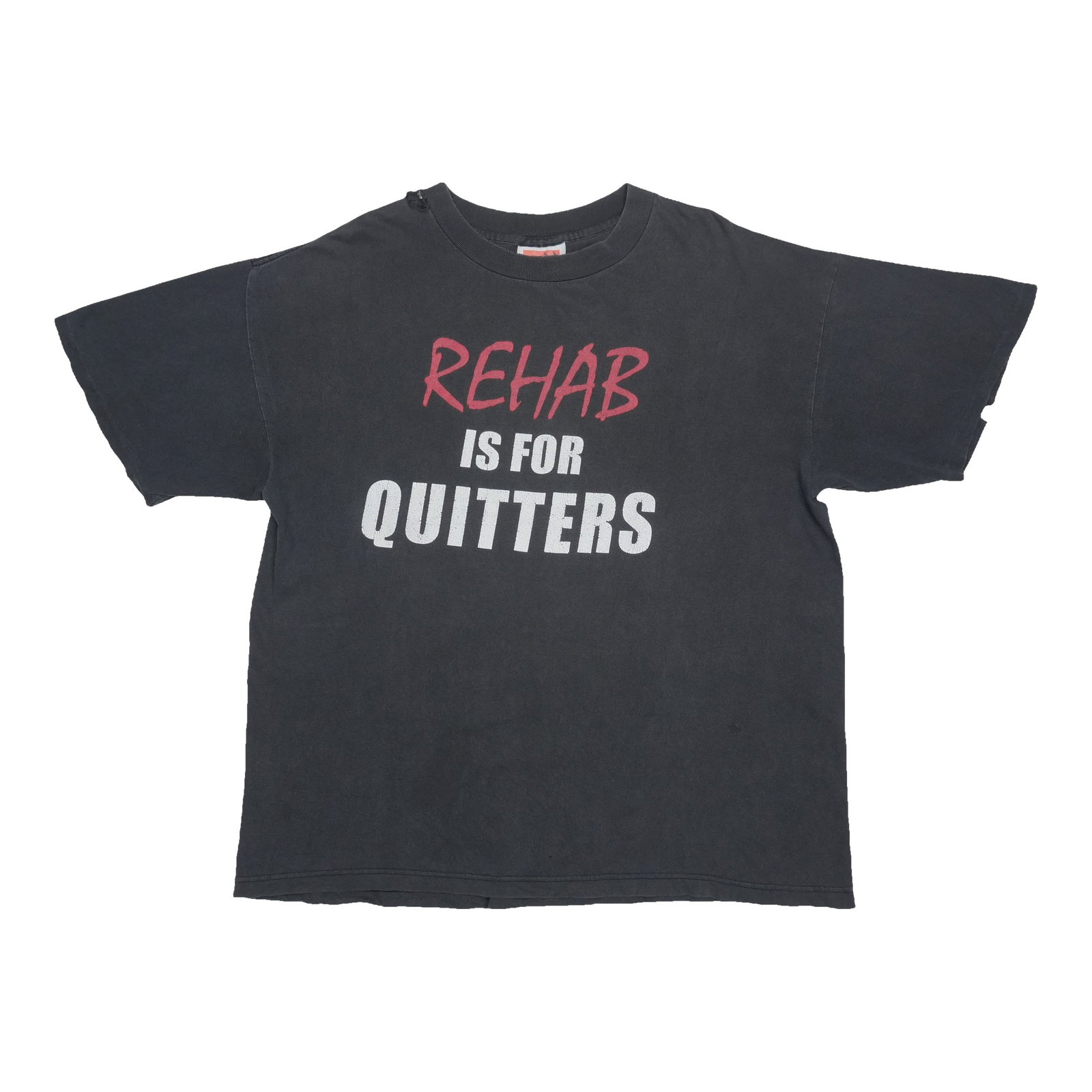 1990s Rehab Is For Quitters Shirt: 1990s Rehab Is For Quitters Shirt Worn and weathered, this vintage Rehab Is For Quitters Shirt from the 1990s boasts a classic black color and a relaxed fit. With its characteristic holes and collar d