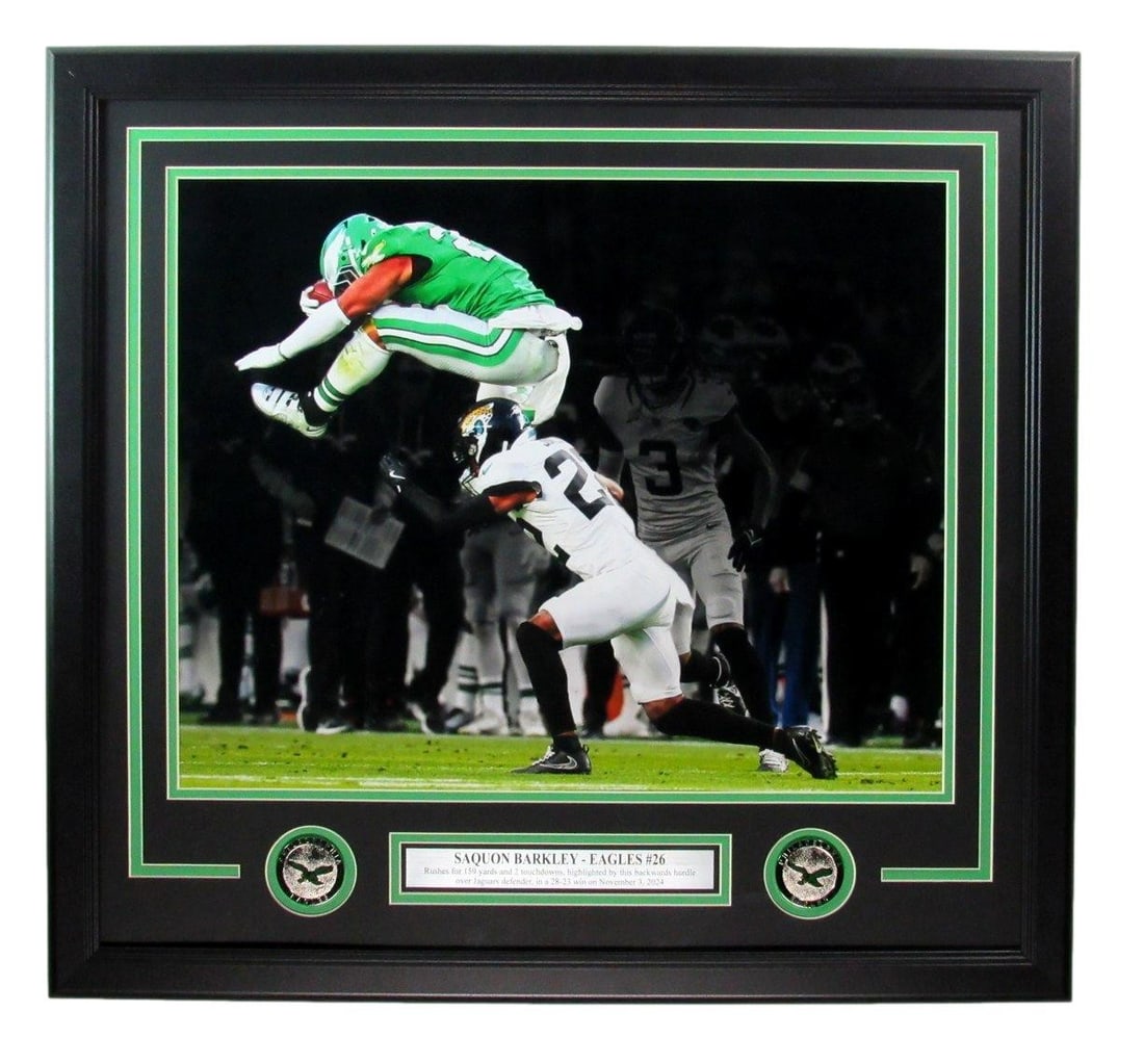 Saquon Barkley Unsigned "The Leap" 16x20 Photo Philadelphia Eagles Framed 193271: Saquon Barkley Unsigned "The Leap" 16x20 Photo Philadelphia Eagles Framed 193271 Unsigned "The Leap" photo by Saquon Barkley, framed in a 16x20 inch format, captures the iconic moment when the Philade