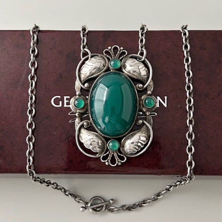 Silver Agate Pendant Necklace w Sterling Silver Original Green No Box 171 By Jensen: Silver Agate Pendant Necklace w Sterling Silver Original Green No Box 171 By Jensen Item Specifics: Brand: Georg Jensen Type: Necklace Metal Purity: 925 Color: Silver Style: Pendant Base Metal: Sterli