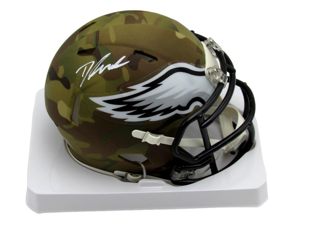 D'Andre Swift Autographed Camo Alternate Mini Helmet Eagles JSA 180005: D'Andre Swift Autographed Camo Alternate Mini Helmet Eagles JSA 180005 D'Andre Swift's autograph on this camo alternate mini helmet adds a unique touch to any Eagles fan's collection. The JSA authenti