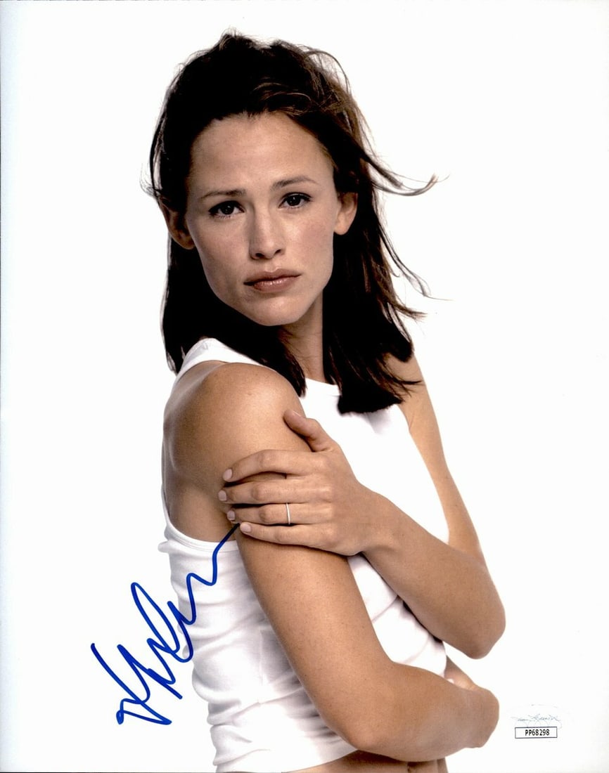 Jennifer Garner Actress "Elektra/ Juno" Signed/ Autograped 8x10 Photo JSA 161299: Jennifer Garner Actress "Elektra/ Juno" Signed/ Autograped 8x10 Photo JSA 161299 8x10 photo of Jennifer Garner as Elektra and Juno, signed by the actress. This rare photo bears the signature of a nota