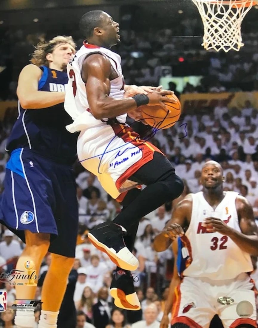 Dwyane Wade Autographed Final MVP vs Nowitzki 16x20 Photo: Dwyane Wade Autographed Final MVP vs Nowitzki 16x20 Photo Item Specifics: Dwyane Wade Autographed "FInal MVP" vs Nowitzki 16x20 Photo Signed in blue sharpie across the front of the photo Inscribed