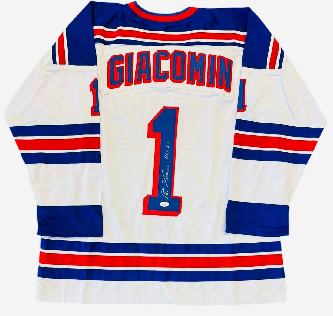Ed Giacomin Autographed New York Rangers Custom Jersey (JSA): Ed Giacomin Autographed New York Rangers Custom Jersey (JSA) Authentic Ed Giacomin autograph on a custom New York Rangers jersey, signed in silver sharpie across the number on the back. The jersey bea
