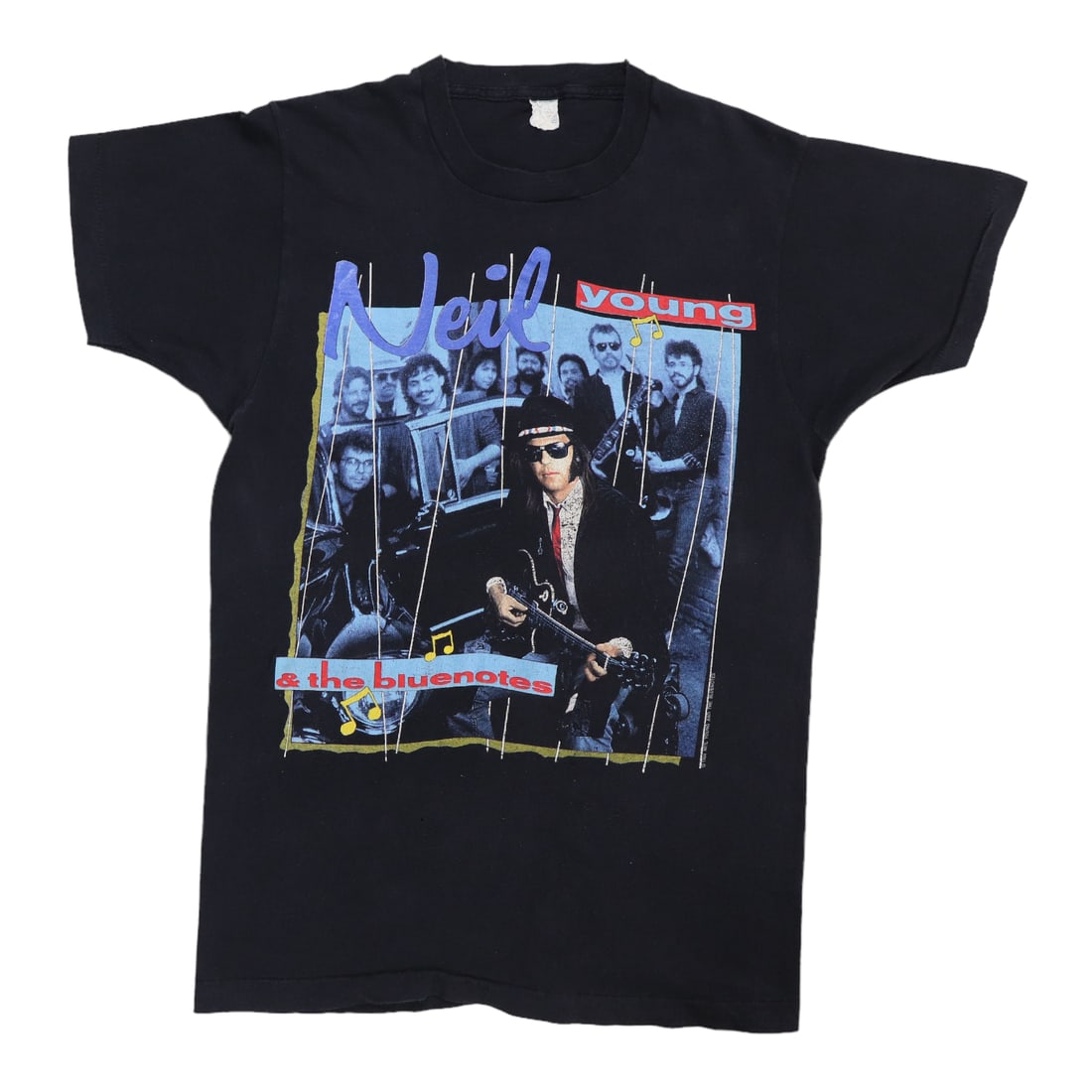 Neil Young 1986 Sponsored By Shirt: Neil Young 1986 Sponsored By Shirt Black 100% cotton shirt from 1986 featuring front and back graphics, with a collar to hem measuring 28 inches and pit to pit dimensions of 18 inches. This vintage sh