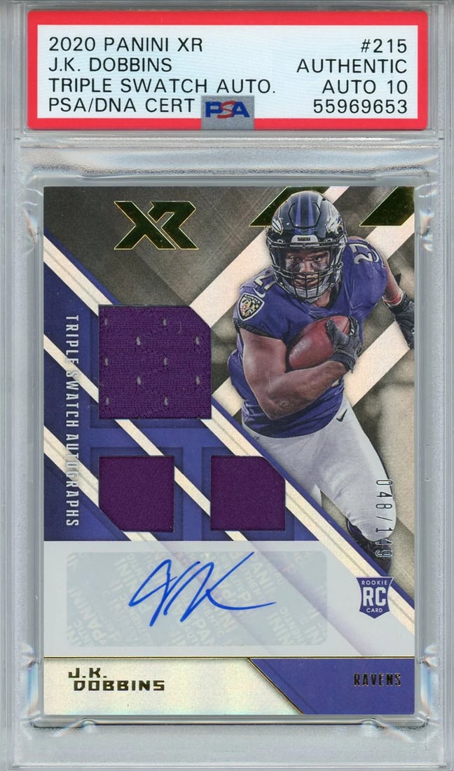 Dobbins JK Autographed PSA Auto Rookie Triple Swatch XR Panini Jersey Card 2020: Dobbins JK Autographed PSA Auto Rookie Triple Swatch XR Panini Jersey Card 2020 Signed by JK Dobbins in blue sharpie, this PSA Auto Rookie Triple Swatch XR Panini Jersey Card features a unique triple 
