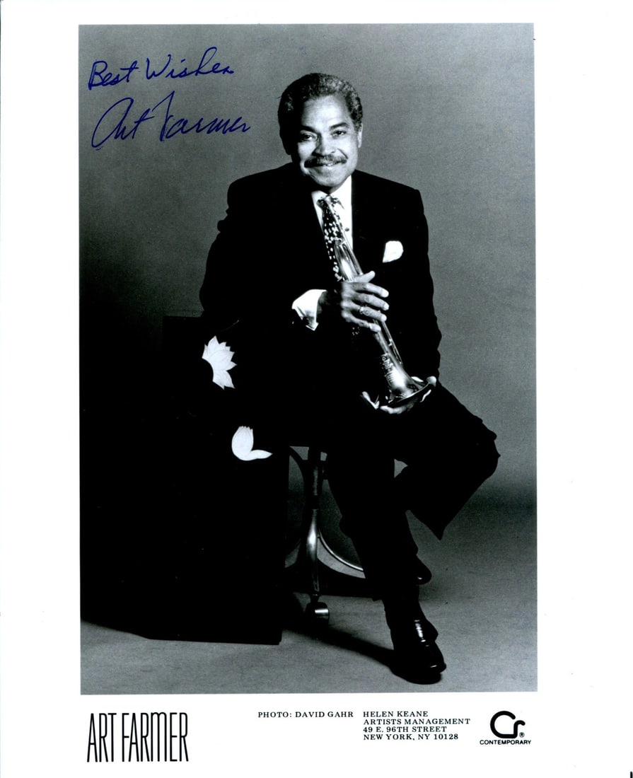 Autographed 8x10 by Art Farmer: Autographed 8x10 by Art Farmer Art Farmer's distinctive signature adds a touch of jazz legend to this 8x10 photo, capturing the essence of his musical style. Signed in blue sharpie across the front, t
