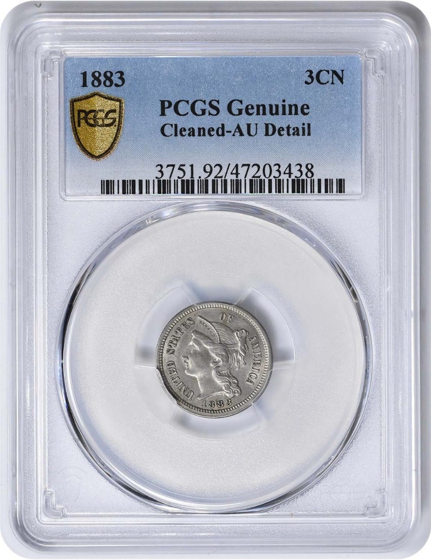 1883 Three Cent Nickel Genuine (Cleaned - AU Detail) PCGS: 1883 Three Cent Nickel Genuine (Cleaned - AU Detail) PCGS The 1883 Three Cent Nickel Genuine, certified by PCGS as Uncirculated, boasts its original copper and nickel composition in a stunning AU deta