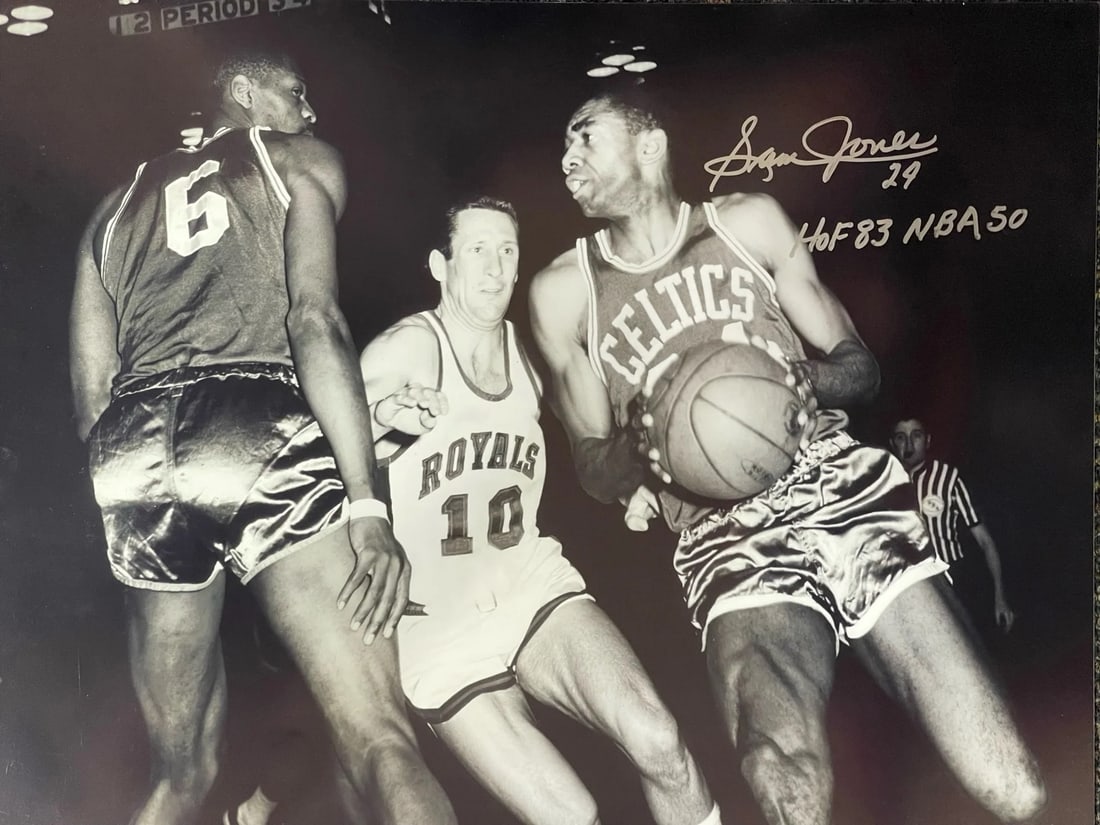 Sam Jones Autographed 16x20 Basketball Photo: Sam Jones Autographed 16x20 Basketball Photo Signed in silver sharpie across the front of the photo with inscription "HOF 83 NBA 50". This unique 16x20 basketball photo features a notable signature fr