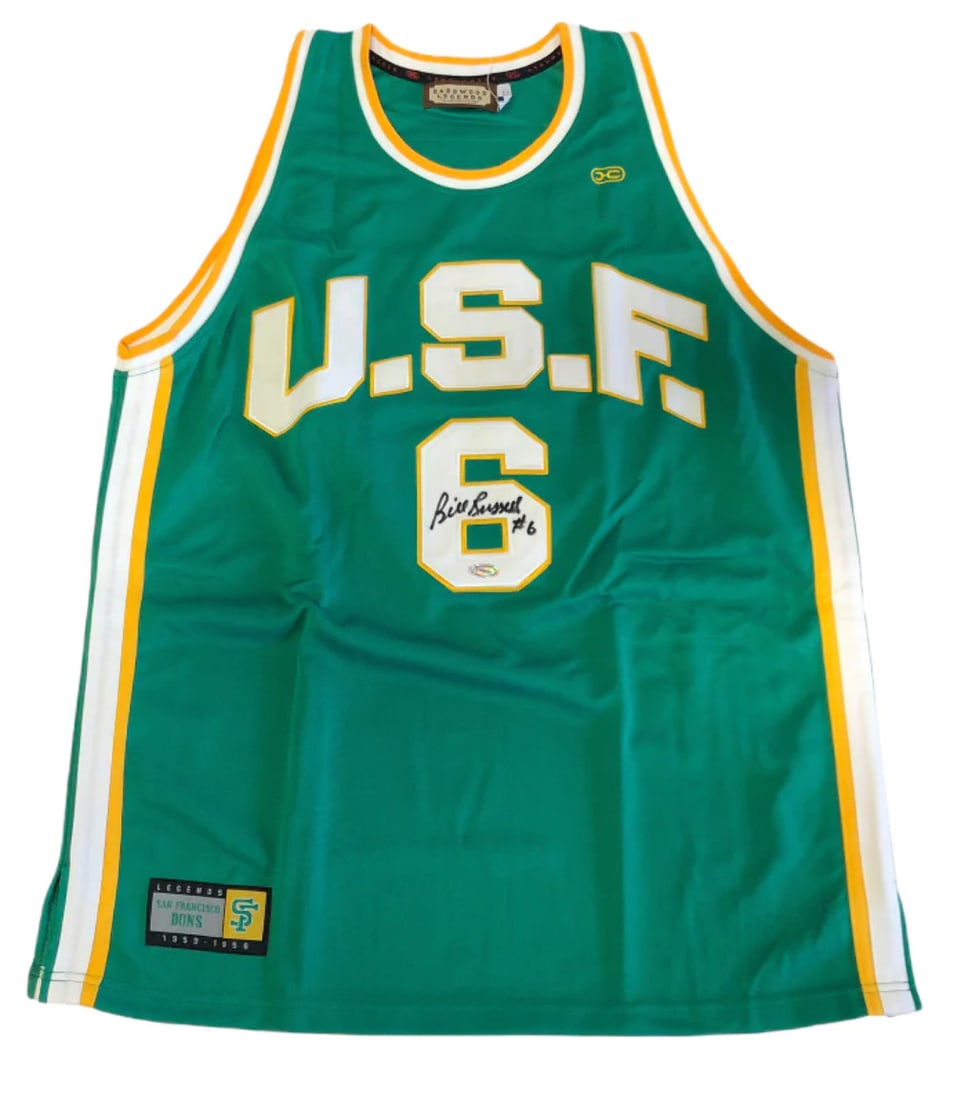 Bill Russell Autographed USF Green Jersey: Bill Russell Autographed USF Green Jersey Signed in black sharpie across the front of the USF Green Jersey, this unique piece bears the mark of basketball legend Bill Russell. The jersey's vibrant gre