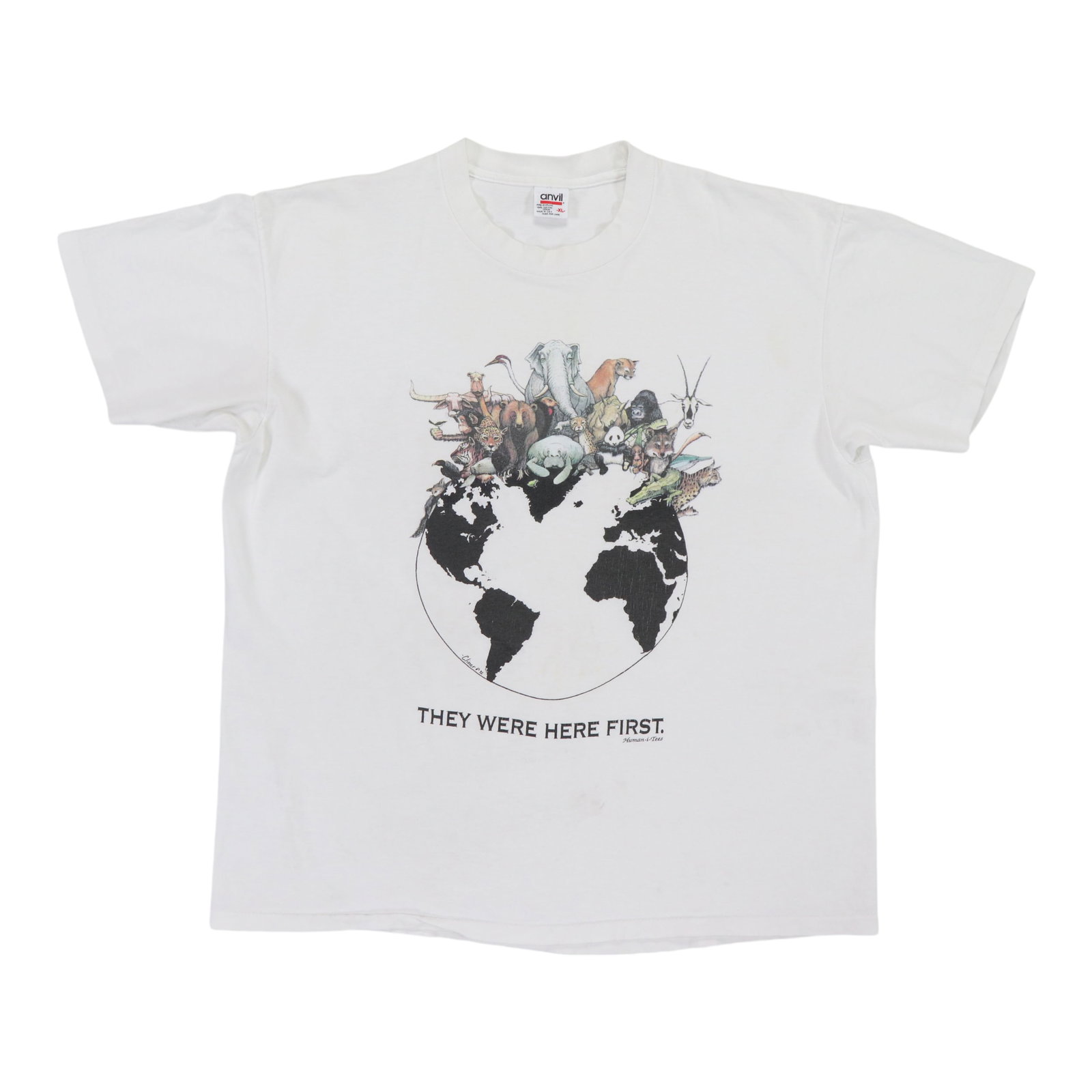 1992 Humanitess They Were Here First Shirt: 1992 Humanitess They Were Here First Shirt Extra Large White Humanitess They Were Here First Shirt, made from 100% cotton, features a classic design with a collar to hem length of 28.5 inches and pit