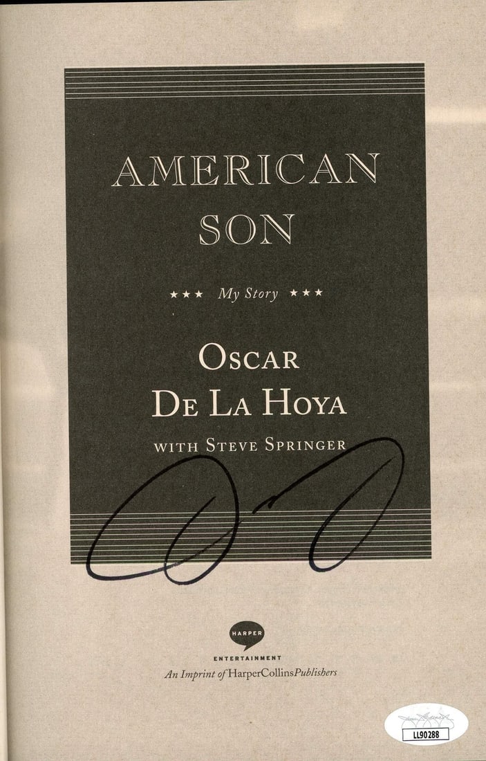 Son American Autographed By Hoya De La Oscar: Son American Autographed By Hoya De La Oscar Signed by Oscar De La Hoya, the American Son book bears a black sharpie signature across its inside pages. Accompanied by a COA from James Spence Authentic