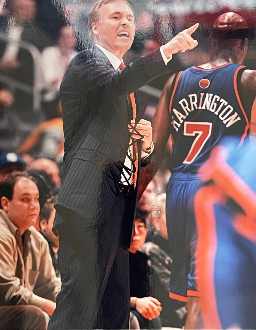 Mike D'Antoni Autographed Basketball 8x10 Photo: Mike D'Antoni Autographed Basketball 8x10 Photo Signed by Mike D'Antoni across the front of an official 8x10 photo, this unique piece showcases the former New York Knicks coach's personal touch. The b