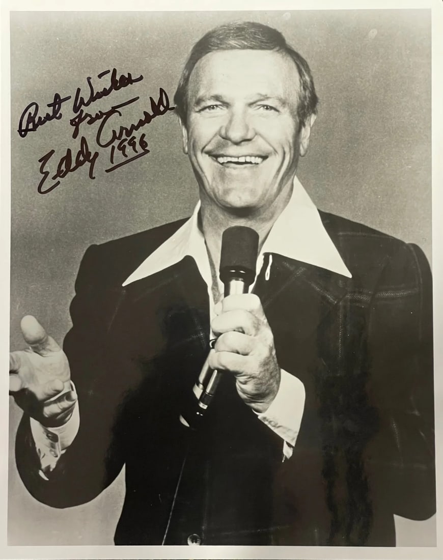Eddy Arnold Autographed 8x10 Celebrity Photo: Eddy Arnold Autographed 8x10 Celebrity Photo Eddy Arnold's iconic smile shines bright in this 8x10 celebrity photo, signed across the front with a warm inscription from 1996. The black sharpie signatu