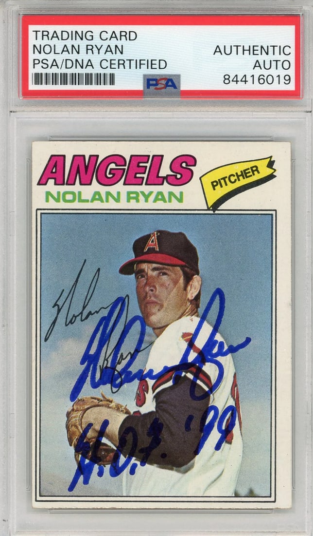 Nolan Ryan HOF 99 Autographed 1977 Topps Card: Nolan Ryan HOF 99 Autographed 1977 Topps Card Signed by Nolan Ryan in blue sharpie, the front of this 1977 Topps card bears an inscription reading "HOF 99". The card has been authenticated and slabbed
