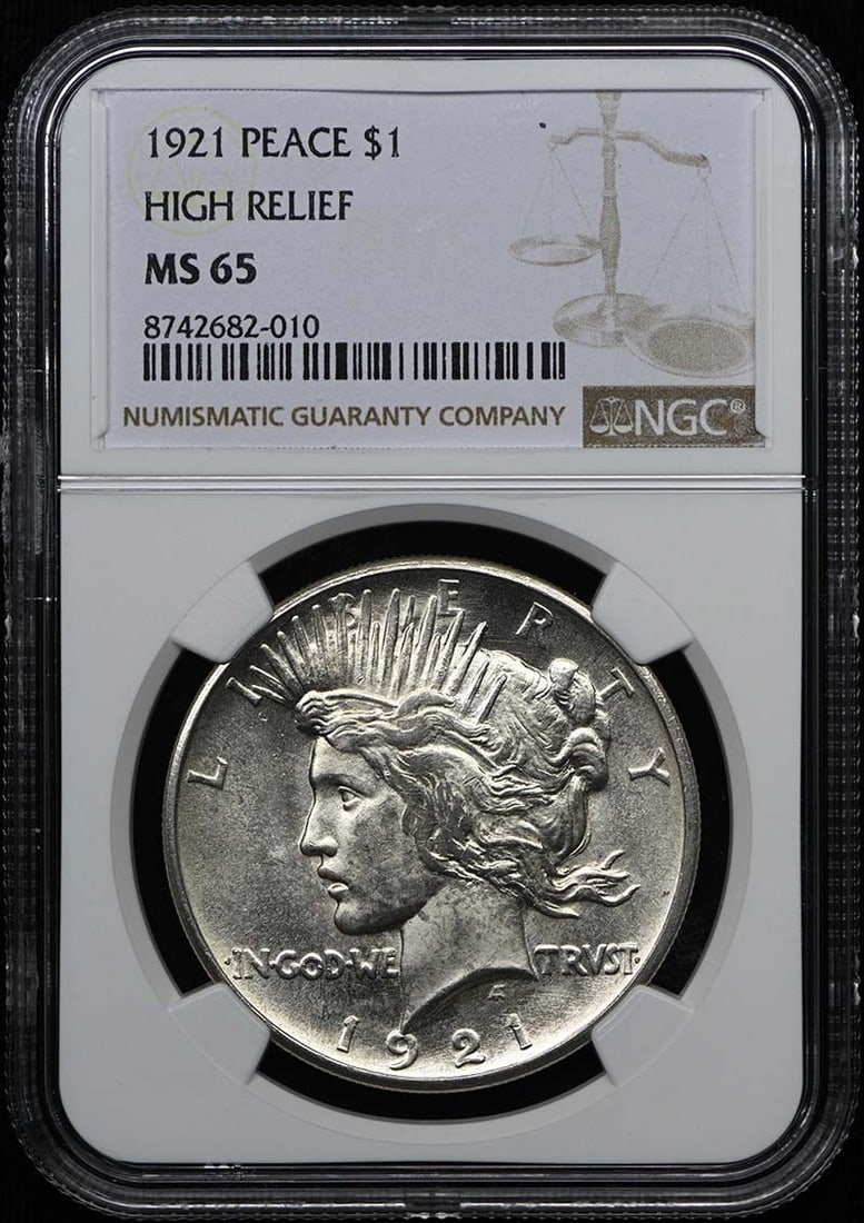 Peace Dollar High Relief $1 NGC MS65: Peace Dollar High Relief $1 NGC MS65 The 1921 Peace Dollar High Relief, graded MS65 by the NGC, boasts striking details and exceptional condition. This uncirculated coin showcases its high relief desi