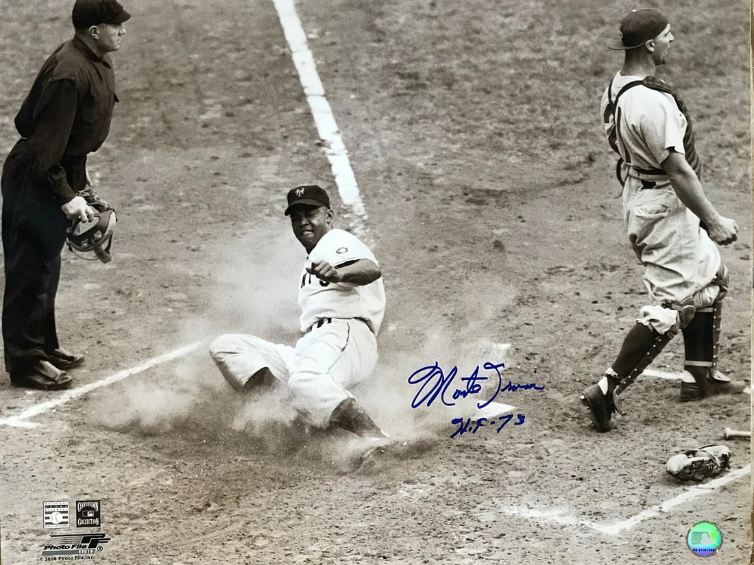 Autographed Baseball Photo by Monte Irvin: Autographed Baseball Photo by Monte Irvin Monte Irvin's 16x20 baseball photo, signed across the front in blue sharpie with the inscription "HOF 73". This official autographed item bears a signature fr