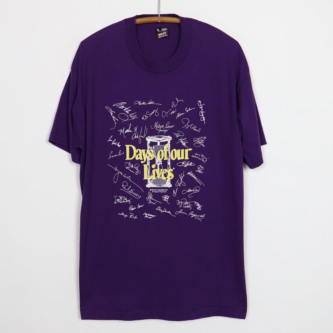Days of Our Lives Shirt 1994: Days of Our Lives Shirt 1994 Extra Large Days of Our Lives Shirt from 1994. This vintage purple shirt features a classic collar-to-hem design and measures 30" at the collar to hem, with pit-to-pit dim