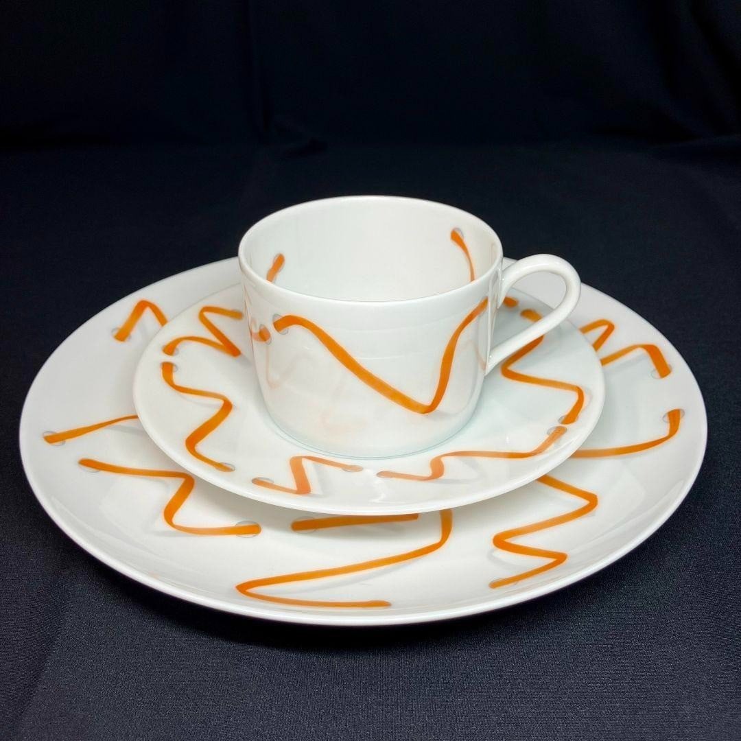 Dancing ribbon cup trio saucer plate porcelain tableware set orange: Dancing ribbon cup trio saucer plate porcelain tableware set orange Item Specifics: Origin: NA Number Of Items In Set: Three-Piece Shape: NA Signed By: NA Occasion: All Occasions Keeps Cold For: NA Vi
