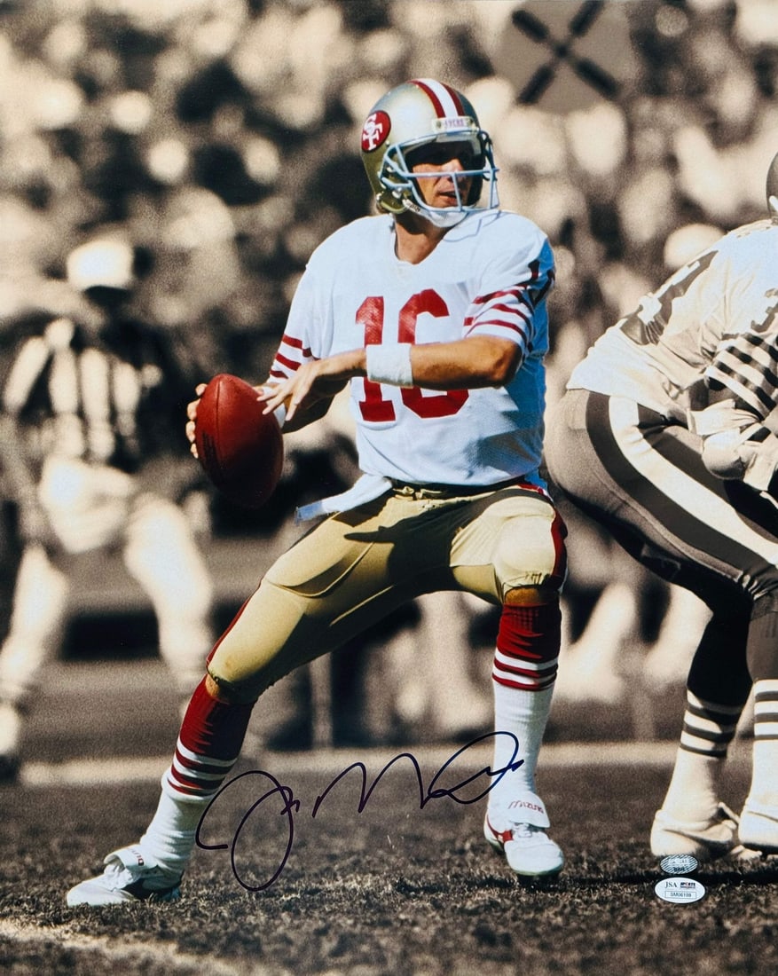 Joe Montana Autographed 49ers 16x20 Football Photo (JSA): Joe Montana Autographed 49ers 16x20 Football Photo (JSA) Joe Montana's iconic number 16 jersey hangs proudly in the background as he signs a 16x20 football photo with his sharpie across the front, cre