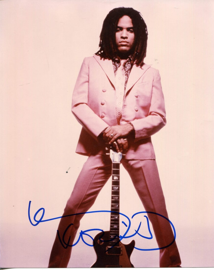 Lenny Kravitz Autographed 8x10 Photo: Lenny Kravitz Autographed 8x10 Photo Lenny Kravitz's iconic image is captured in this 8x10 photo, bearing his signature in blue sharpie across the front. The item comes with authentication from Rich A