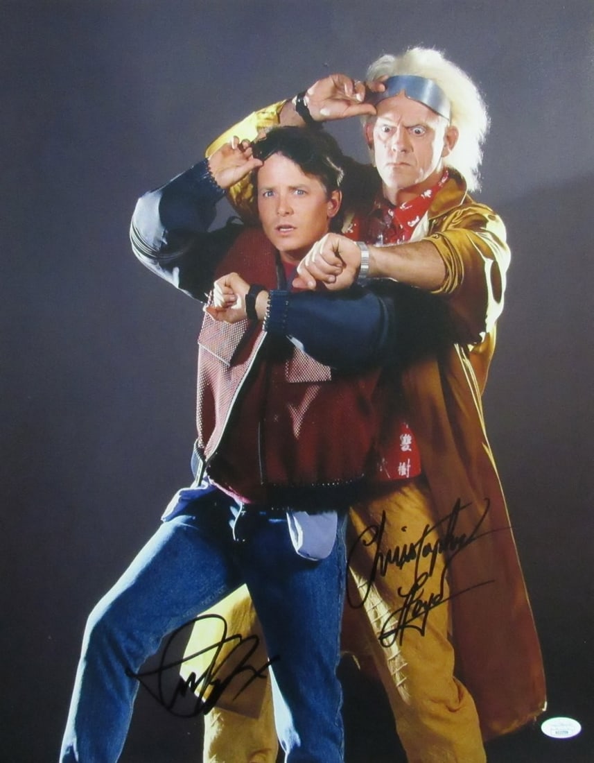 JSA Auto 16x20 Photo Back to Future Michael J Fox Christopher Lloyd Sign: JSA Auto 16x20 Photo Back to Future Michael J Fox Christopher Lloyd Sign This 16x20 photo back features an iconic scene from the Back to the Future trilogy, with Michael J. Fox as Marty McFly and Chri