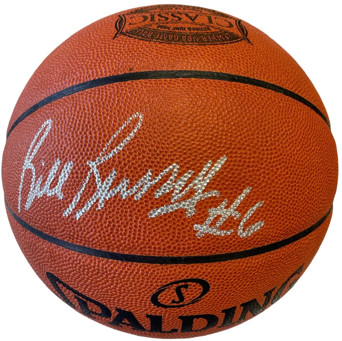 Bill Russell Autographed 2006 Retired Leather Basketball (JSA): Bill Russell Autographed 2006 Retired Leather Basketball (JSA) Signed in silver paint pen above the Spalding Logo, Bill Russell's mark adds an unmistakable touch to this retired leather basketball. Th