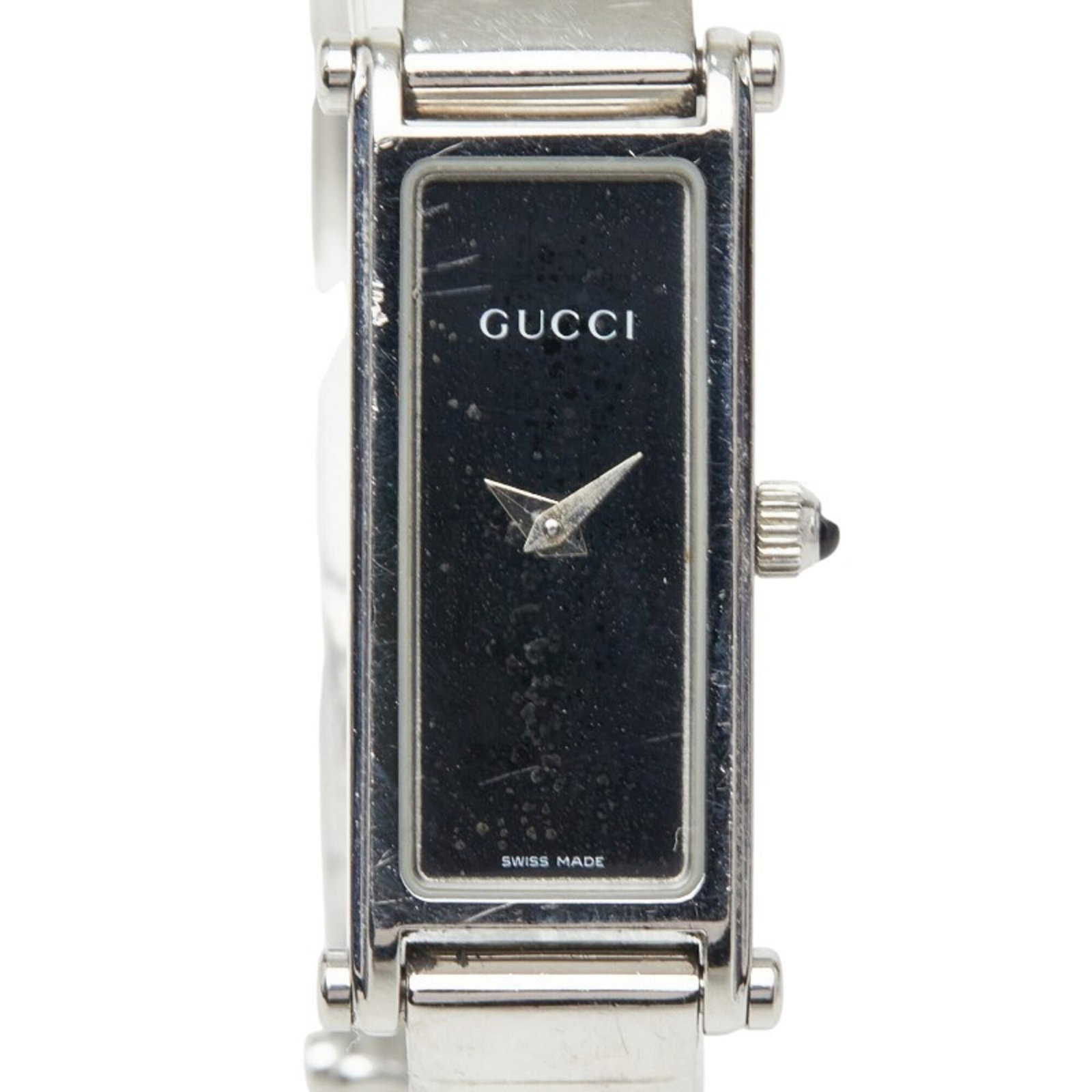 Gucci Wristwatch: Gucci Wristwatch Stainless steel case and band provide a sleek, modern look for the Gucci wristwatch. The black dial stands out against its simple, understated design, while quartz movement keeps time