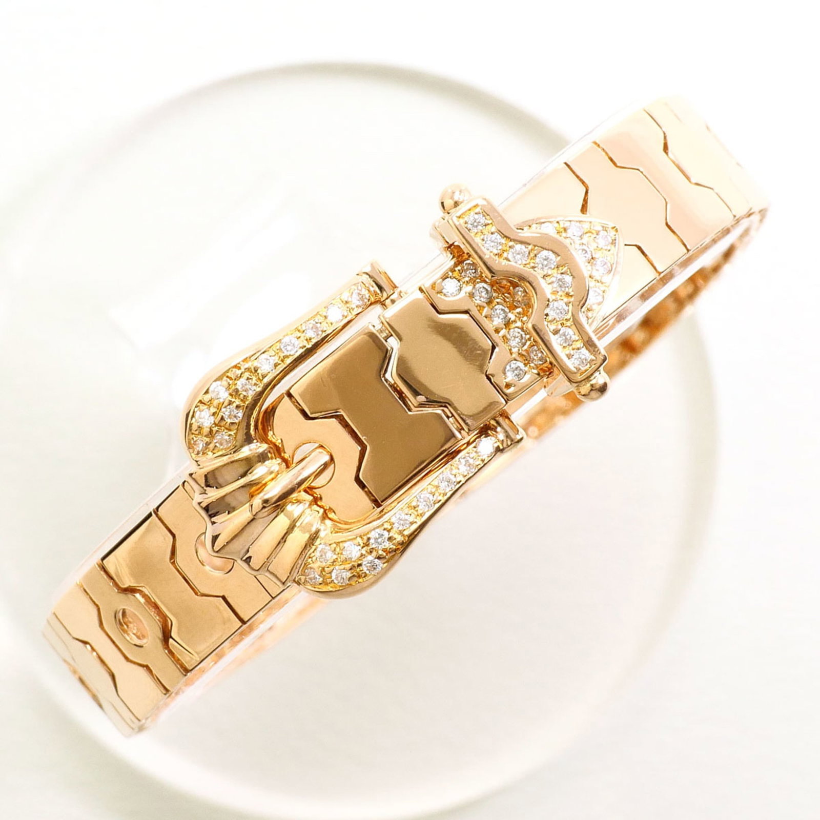 Charm bracelet pink gold 18K unbranded: Charm bracelet pink gold 18K unbranded Pink gold 18K charm bracelet with a delicate 17cm length, weighing 18.4g, features an elegant pink gold finish. The unbranded design showcases the beauty of its 