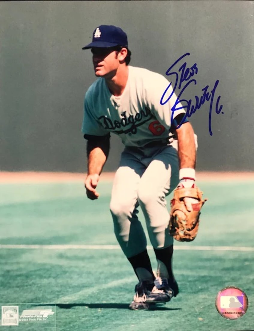 Steve Garvey Autographed 8x10 Baseball Photo: Steve Garvey Autographed 8x10 Baseball Photo Signed in blue sharpie across the front, this 8x10 baseball photo features Steve Garvey's unmistakable signature. A nostalgic piece for fans of the Hall of