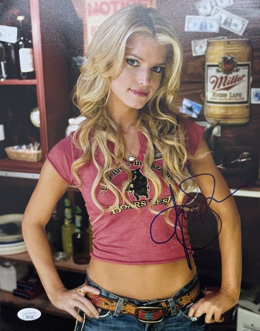 Jessica Simpson Singer Signed 11x14 Autographed Photo JSA 211677: Jessica Simpson Singer Signed 11x14 Autographed Photo JSA 211677 Signed by Jessica Simpson, this 11x14 photo captures her in a moment of performance. The item bears the JSA authentication stamp, verif