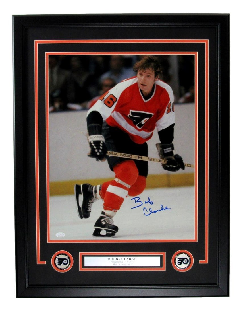 Bobby Clarke HOF Autographed 16x20 Photo Philadelphia Flyers Framed JSA: Bobby Clarke HOF Autographed 16x20 Photo Philadelphia Flyers Framed JSA Bobby Clarke's iconic image as a Philadelphia Flyer is captured in stunning detail on this 16x20 photo, signed by the legendary 