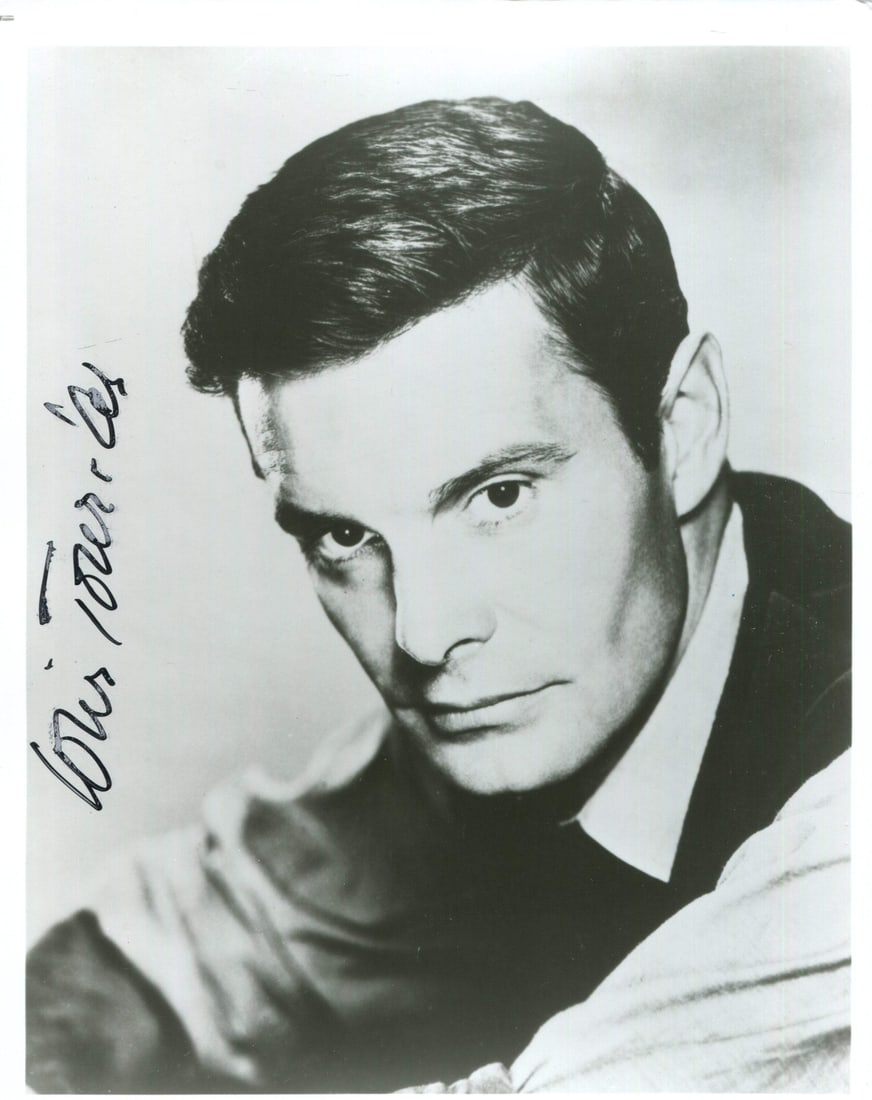 Jourdan Louis Autographed Photo: Jourdan Louis Autographed Photo Signed by the renowned French actor Louis Jourdan, this 8x10 photo showcases his captivating presence. The black sharpie signature across the front adds a touch of eleg