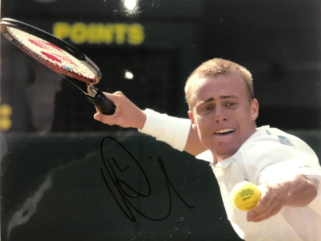 Lleyton Hewitt Autographed 8x10 Tennis Photo: Lleyton Hewitt Autographed 8x10 Tennis Photo Lleyton Hewitt's sharpie signature adds a touch of authenticity to this official 8x10 tennis photo, capturing the Australian tennis legend in action. The b