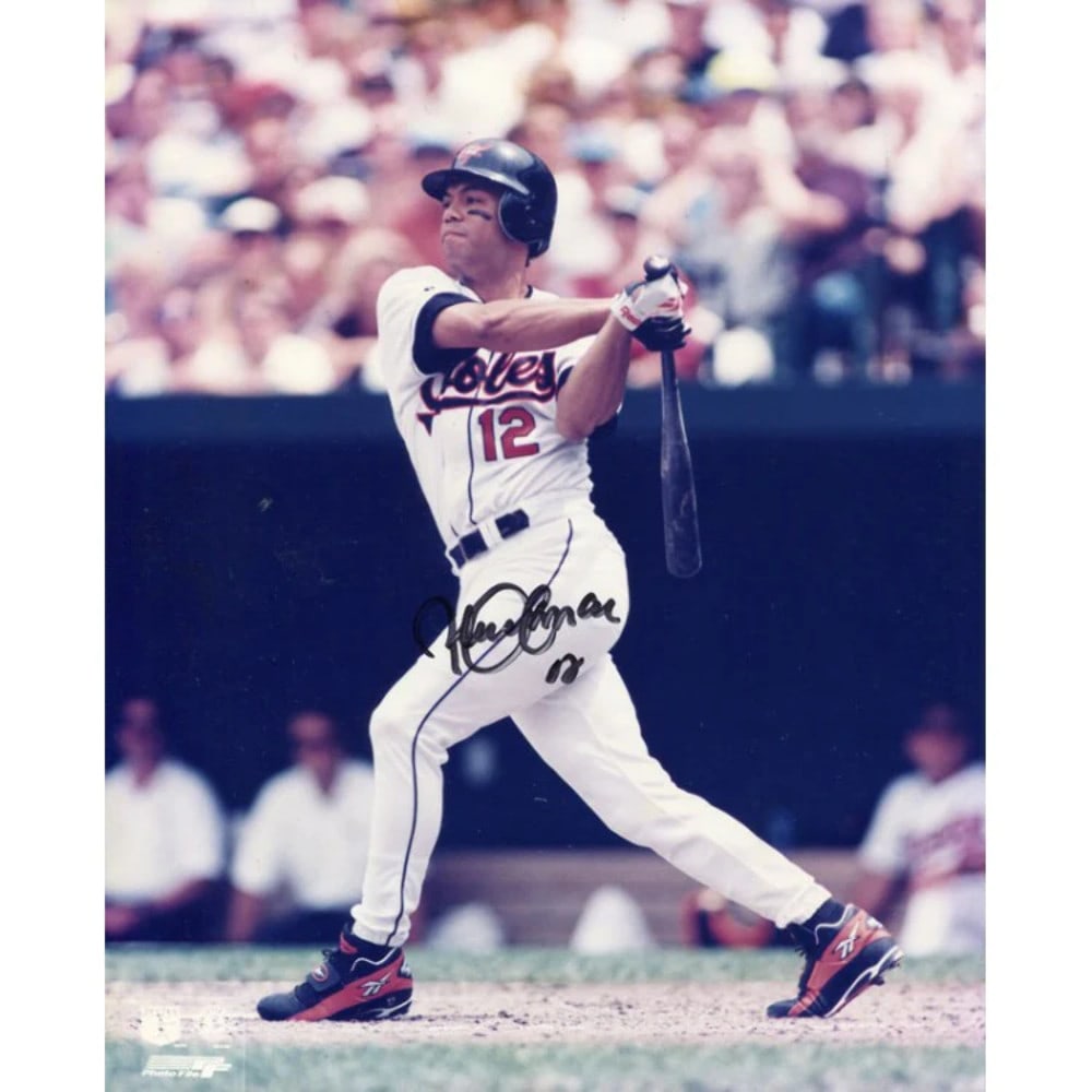 Roberto Alomar Autographed 8x10 Photo: Roberto Alomar Autographed 8x10 Photo Item Specifics: Signed in black sharpie across the front of photo Roberto is looking at the ball after hitting, while playing with the Baltimore Orioles Item is a