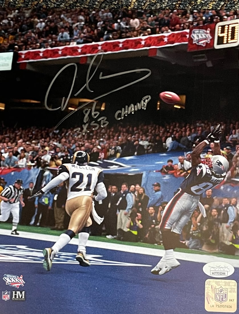 David Patten Autographed 8x10 Football Photo (JSA): David Patten Autographed 8x10 Football Photo (JSA) Signed in silver sharpie across the front of the photo with inscription "3X SB Champ". This official David Patten autographed 8x10 football photo bea