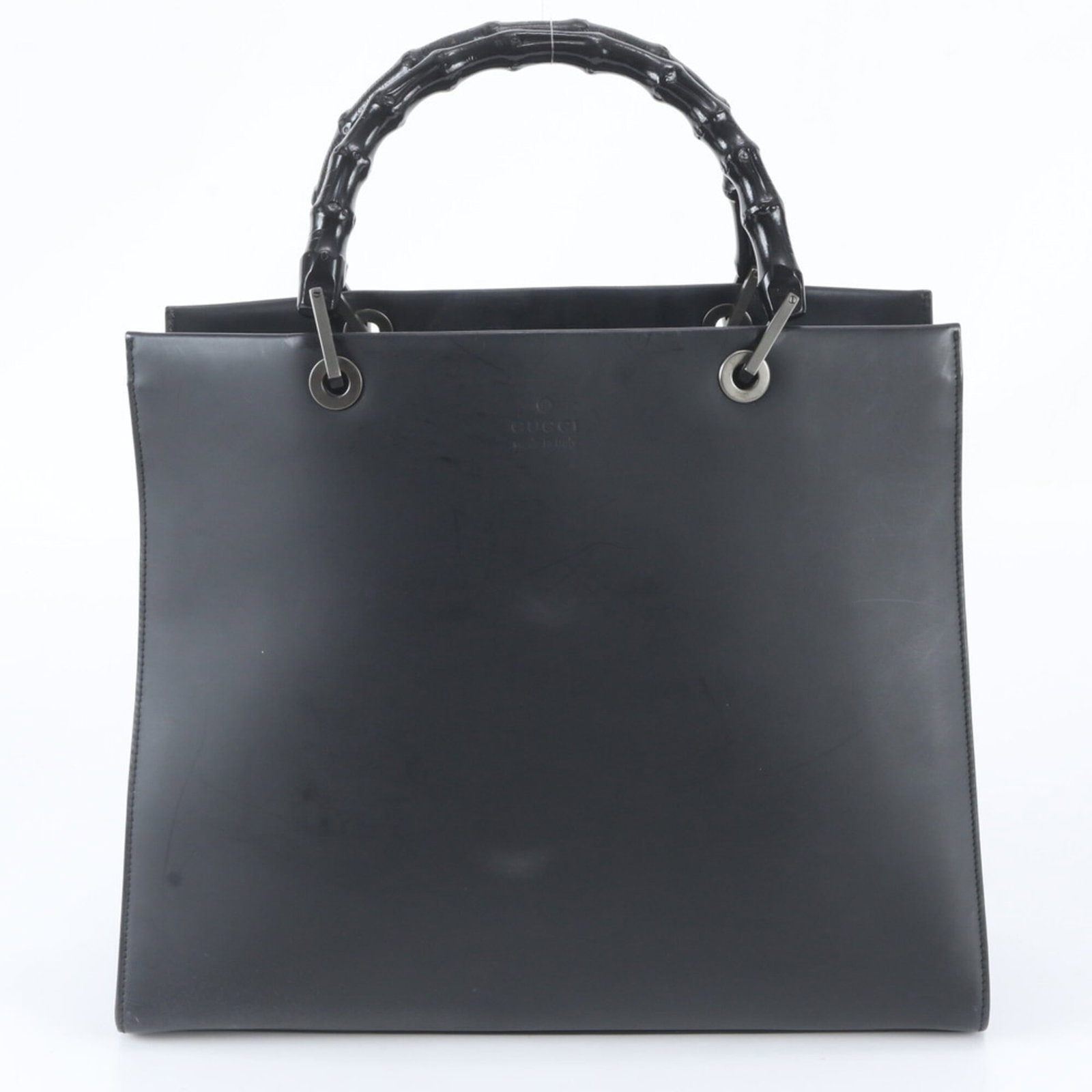Handbag Tote Leather Gucci: Handbag Tote Leather Gucci Black leather Gucci tote bag with a classic design, measuring 29cm x 35cm x 11cm. The bag features a long handle that extends to 35cm for comfortable carrying. Made from hig
