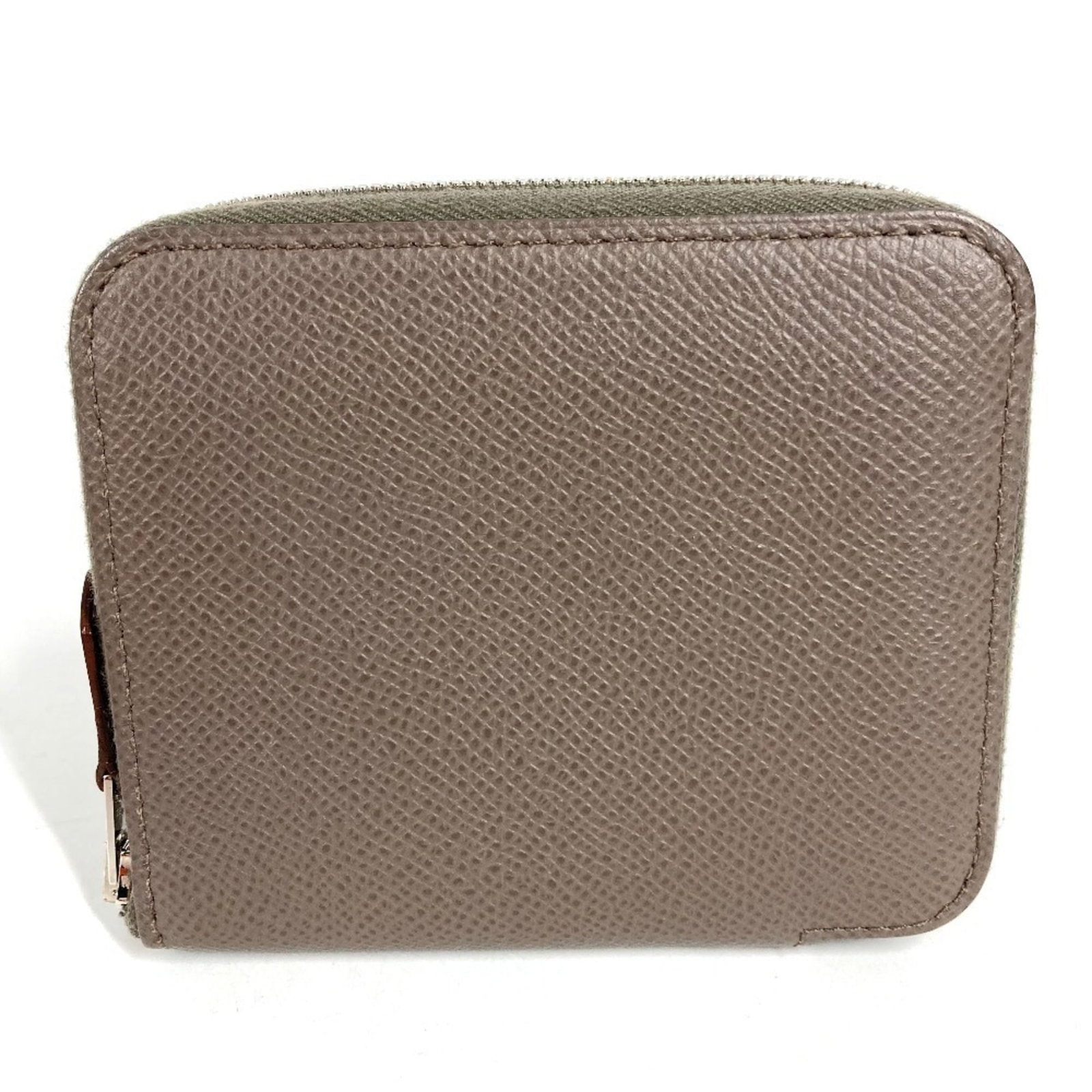 Hermes Coin Purse/ Coin Case Epsom Leather: Hermes Coin Purse/ Coin Case Epsom Leather Epsom leather craftsmanship shines in this sleek coin purse from Hermes, expertly crafted to hold your essentials. Measuring 9cm x 11cm, the compact design m