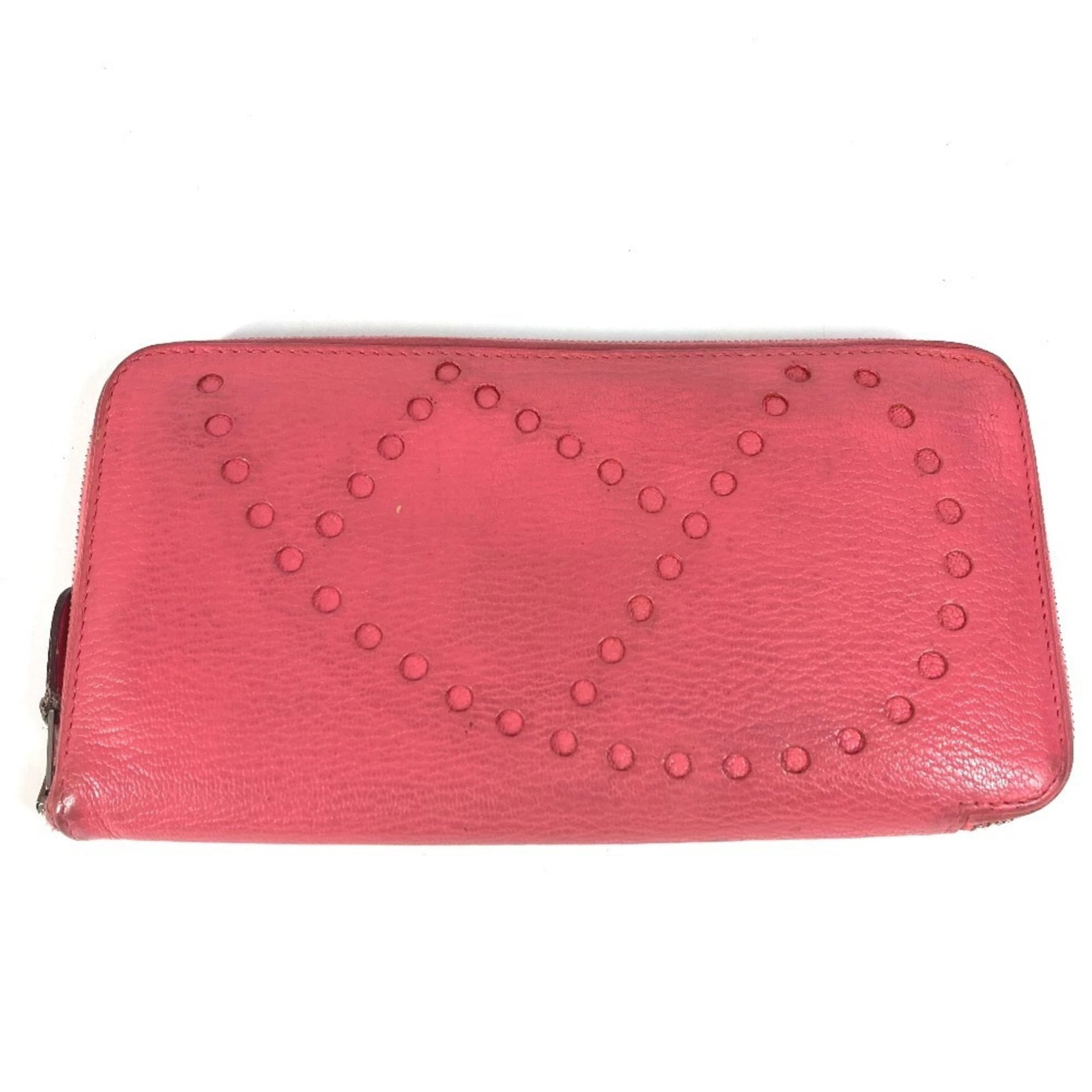 Chevre leather bi fold wallet from Hermes: Chevre leather bi fold wallet from Hermes Chevre leather bi-fold wallet from Hermes features a unique pink color and measures 10cm x 19.5cm in size, making it a distinctive accessory for everyday use.