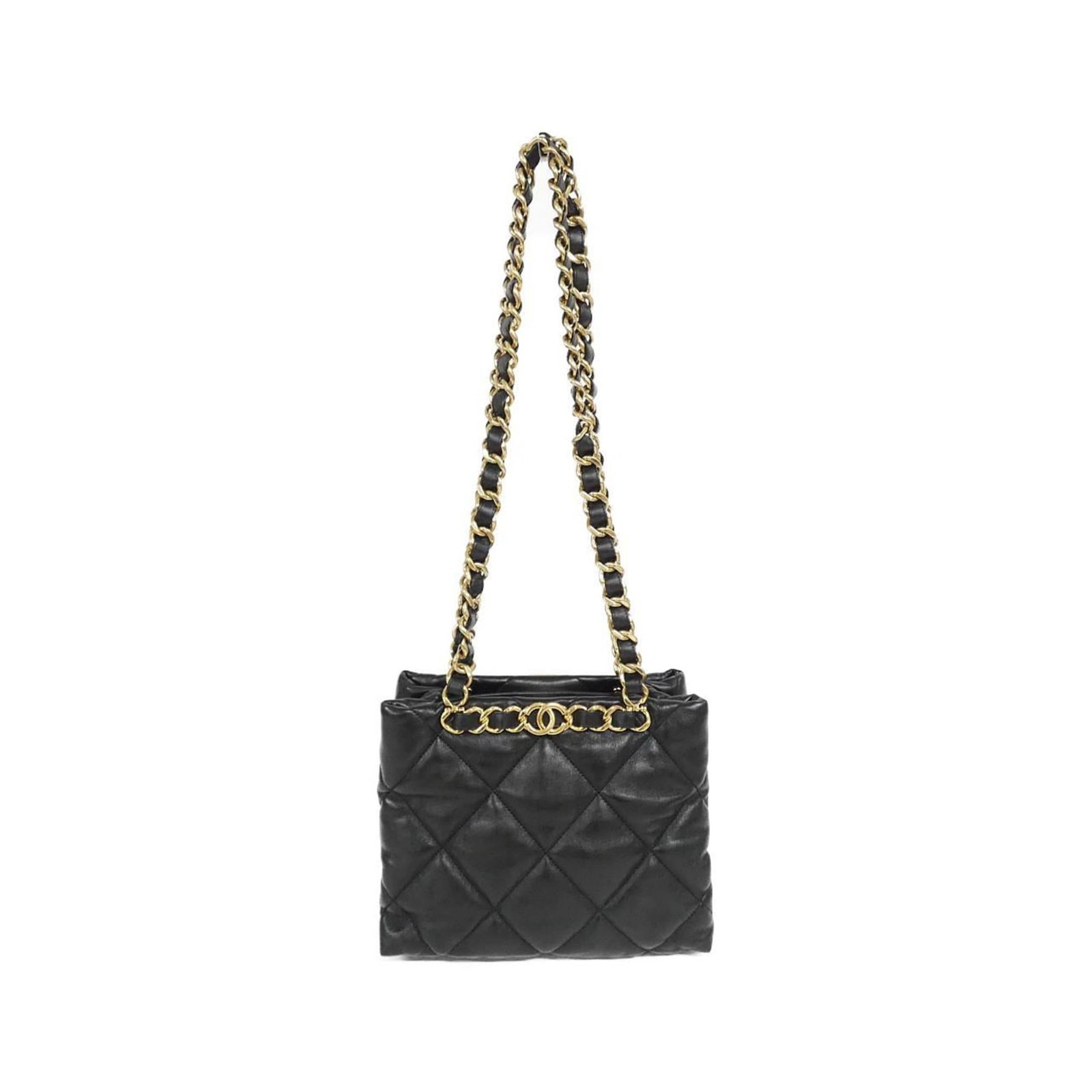 Chanel Shoulder Bag Leather: Chanel Shoulder Bag Leather Chanel's iconic shoulder bag features sleek, black lambskin leather and a timeless design. This compact bag measures 19cm x 25cm x 9.5cm and comes with its original box and