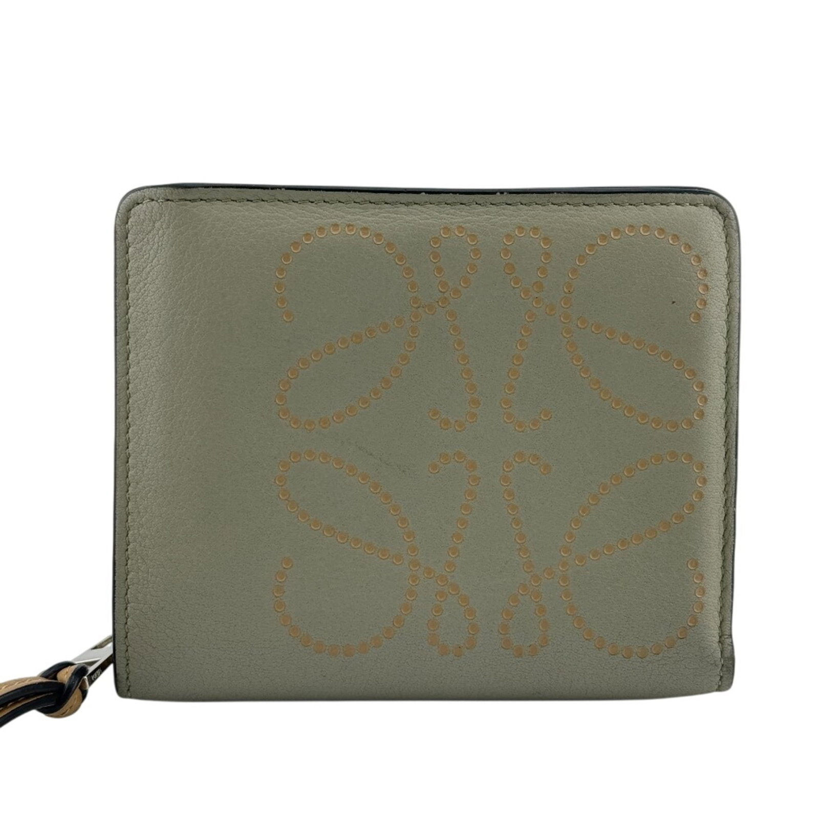 Loewe Coin Purse/ Coin Case Leather: Loewe Coin Purse/ Coin Case Leather This Loewe coin purse features a striking green and khaki leather design, measuring 9.5cm x 11cm in size. The classic style showcases the brand's signature craftsma