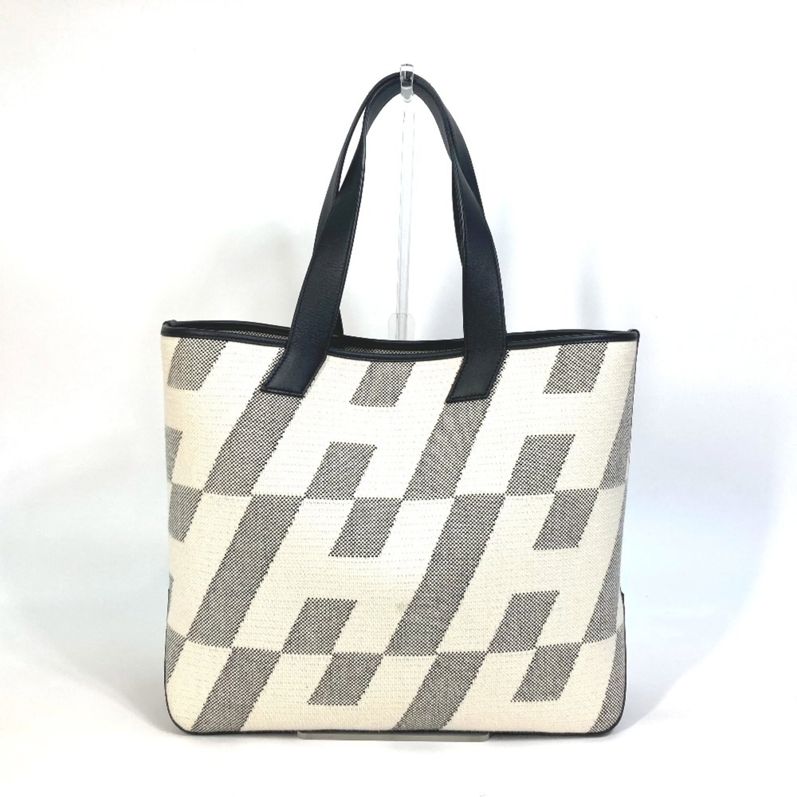 Swift leather canvas tote handbag Hermes: Swift leather canvas tote handbag Hermes Swift leather canvas tote handbag from Hermes, featuring a classic design with a canvas and swift leather combination in black, gray, or white. This stylish to