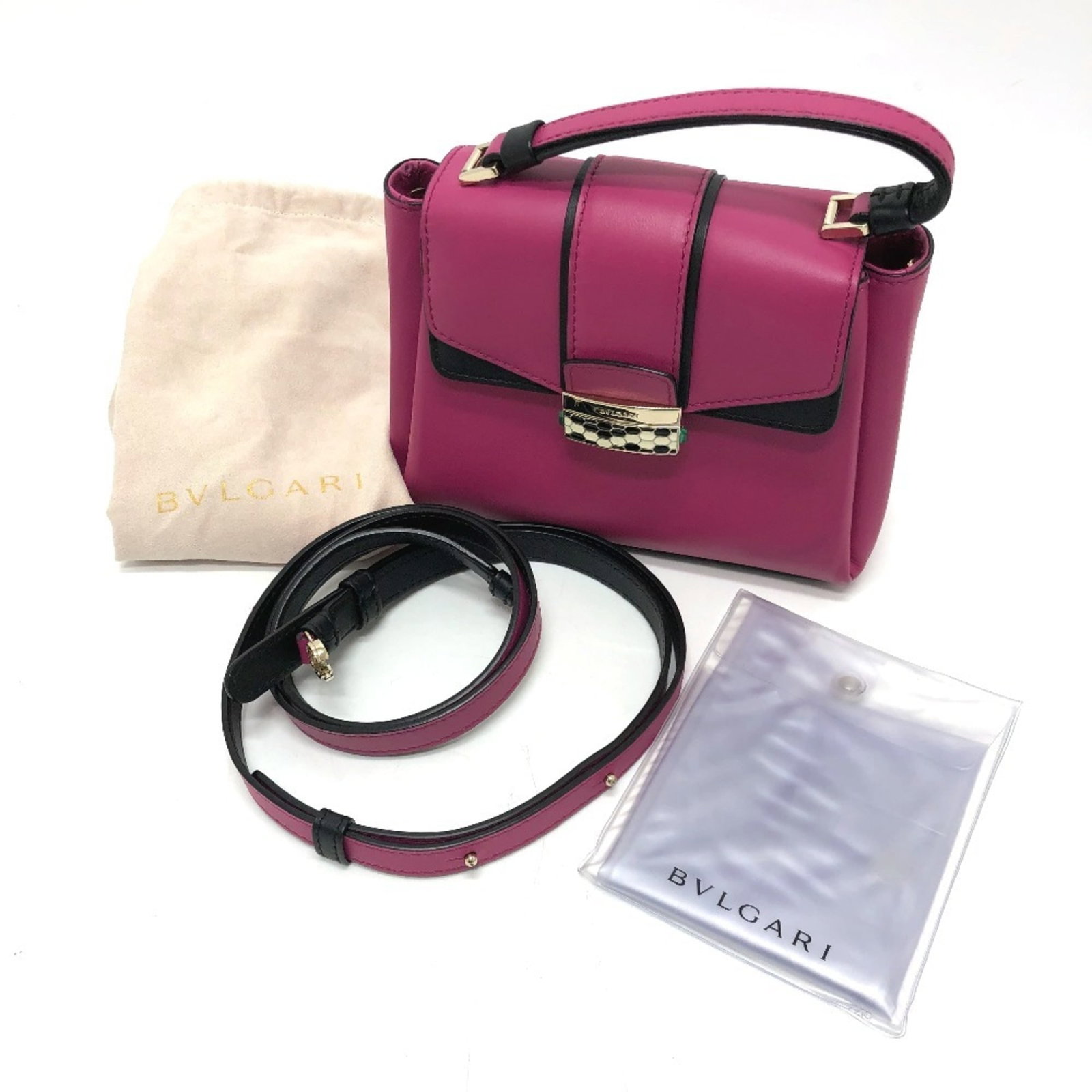 Bvlgari Shoulder Bag Leather: Bvlgari Shoulder Bag Leather Pink Bvlgari Leather Shoulder Bag with Gold Hardware. This stylish shoulder bag features high-quality leather and gold hardware, making it a chic accessory for any occasio