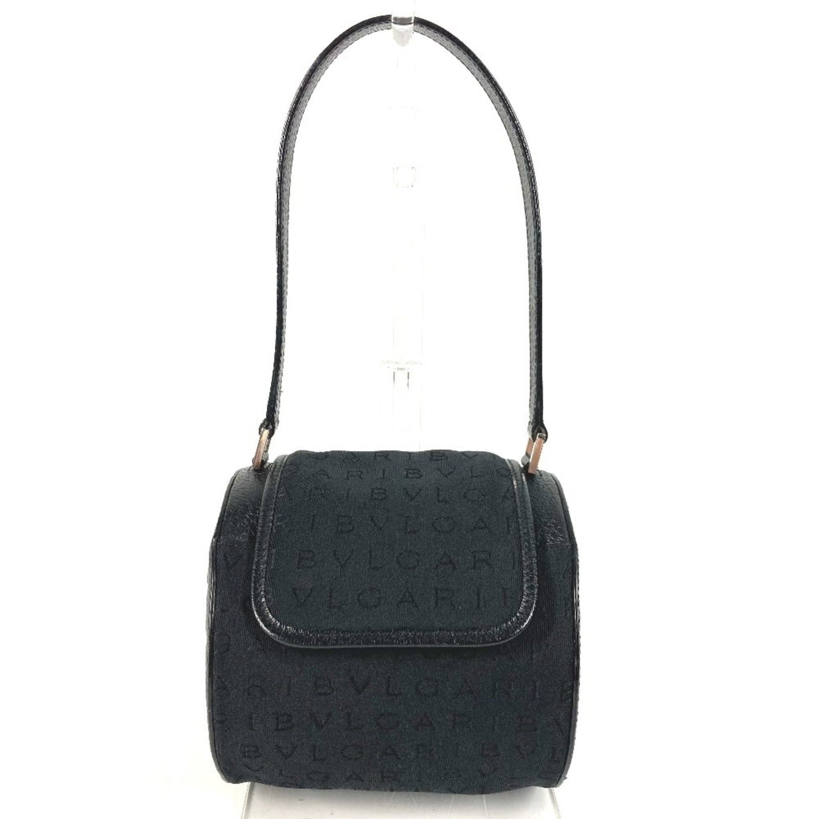 Bvlgari Handbag Shoulder Bag Leather Canvas: Bvlgari Handbag Shoulder Bag Leather Canvas This sleek Bvlgari shoulder bag features a striking black leather and canvas design, making it a stylish addition to any woman's wardrobe. Measuring just