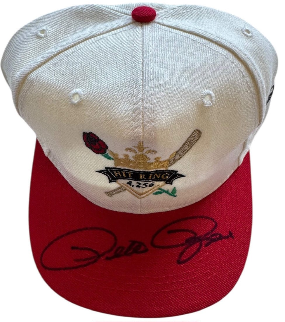 Pete Rose Autographed Hit King 4256 Otta Cap: Pete Rose Autographed Hit King 4256 Otta Cap The Pete Rose Autographed Hit King 4256 Otta Cap features a sharpie signature across the front of the hat on top of the bill, bearing the mark of baseball