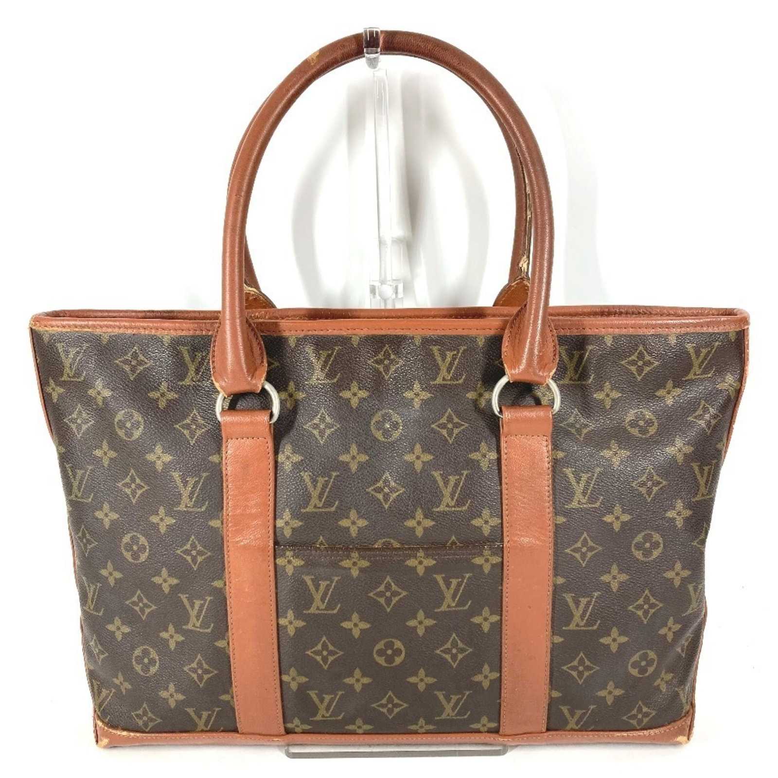 Louis Vuitton Shoulder Monogram Tote Bag: Louis Vuitton Shoulder Monogram Tote Bag Brown Louis Vuitton Shoulder Monogram Tote Bag, measuring 28.5cm x 40cm x 10cm, features the iconic monogram pattern and is made from high-quality materials.